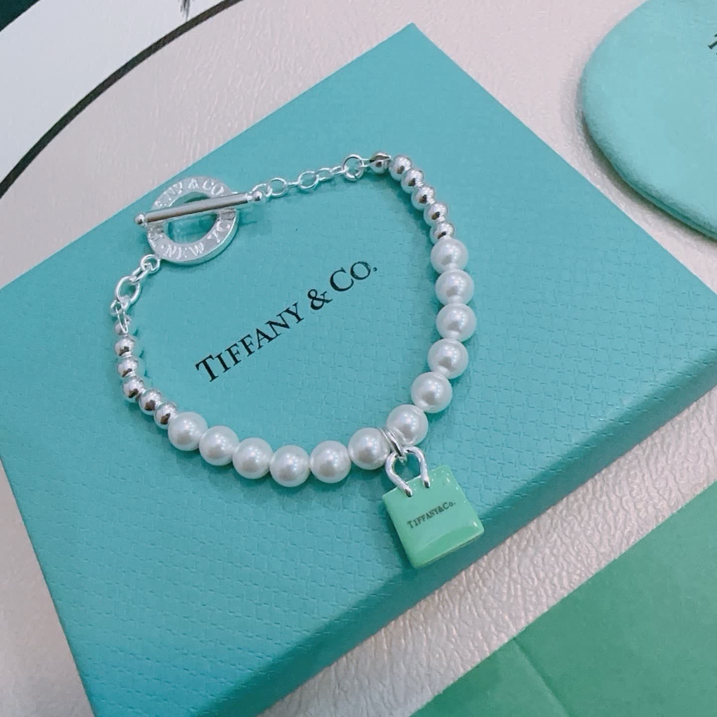 Tiffany & Co. Pearl Bracelet with Tag Charm